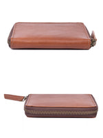 Open tan zip-around wallet showing card slots on both sides