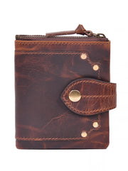 Folded weathered-brown snap wallet with rivet details and top zip